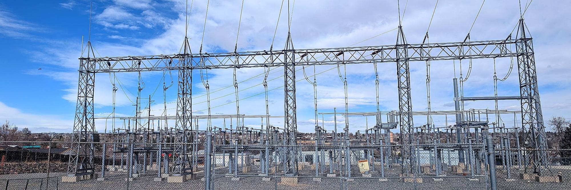 Electric substation with lattice steel structures and overhead lines
